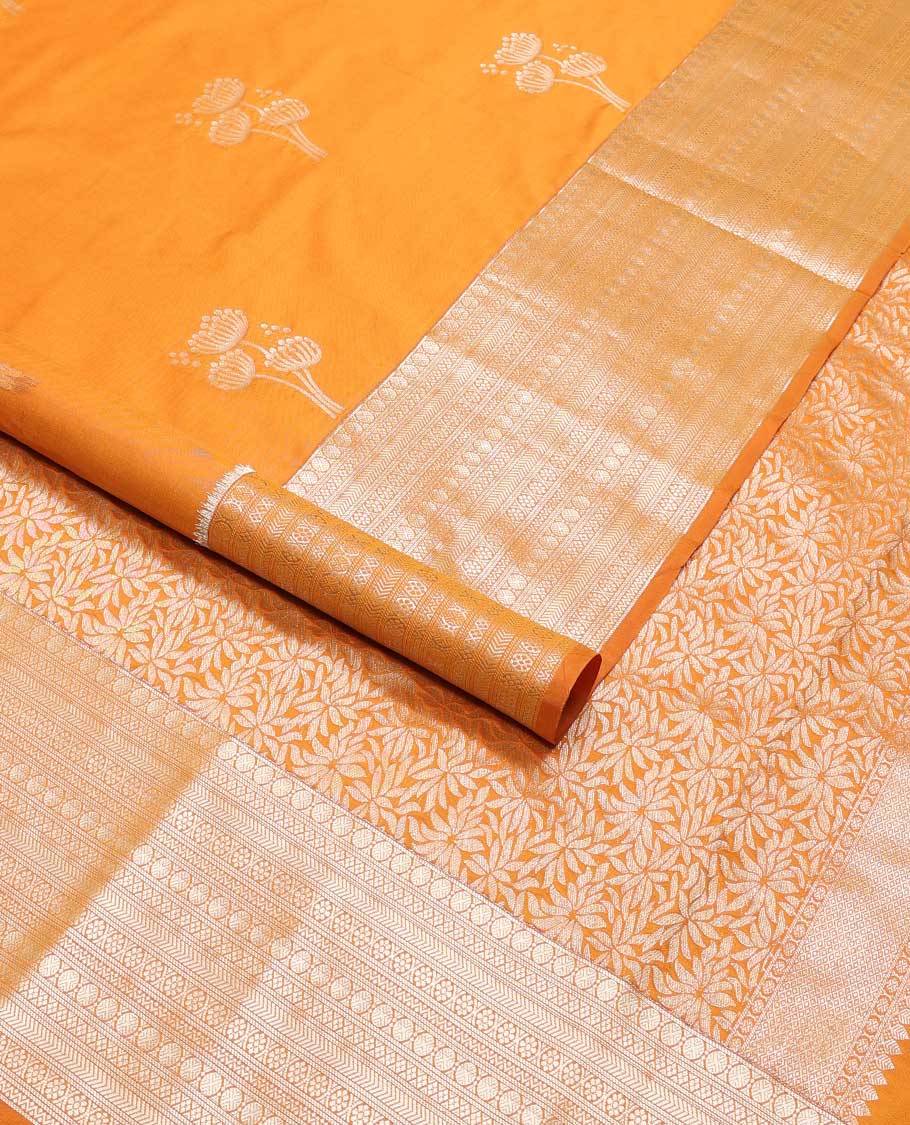 Orange floral design vasundhara elite silk saree with self border of intricate zari design & floral jaal design pallu