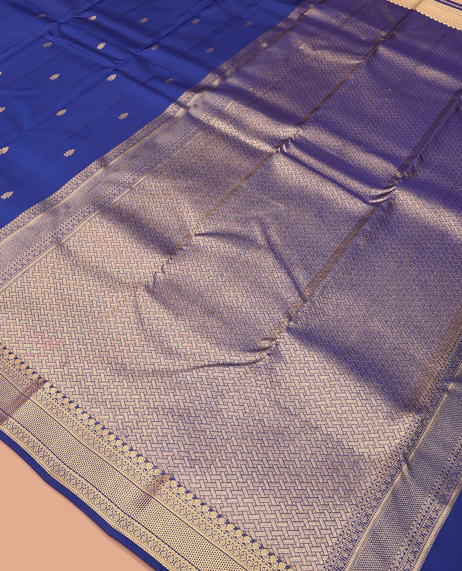 Blue zari buttas Vasundhara silk mix saree, zari border of manga mokku, muthu, neli, kamalam, and ara maadam, and pai yaadi kattam pallu