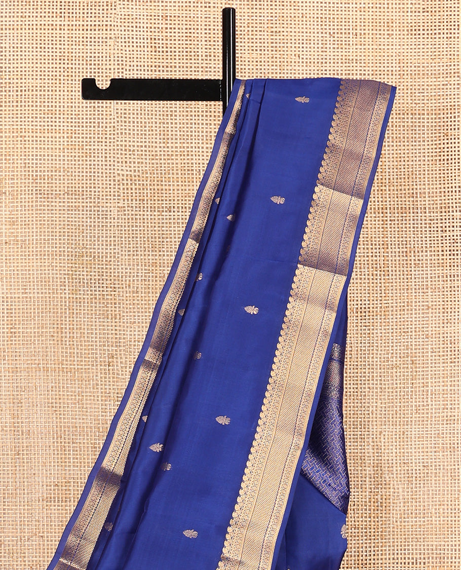 Blue zari buttas Vasundhara silk mix saree, zari border of manga mokku, muthu, neli, kamalam, and ara maadam, and pai yaadi kattam pallu