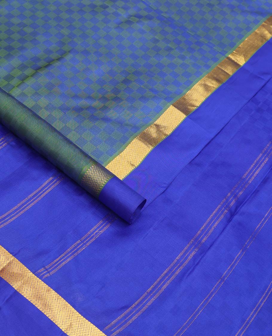 Blue paiyadi kattam Kanchipuram silk saree, contrast border of muthu, and vanki designs, and zari striped pallu