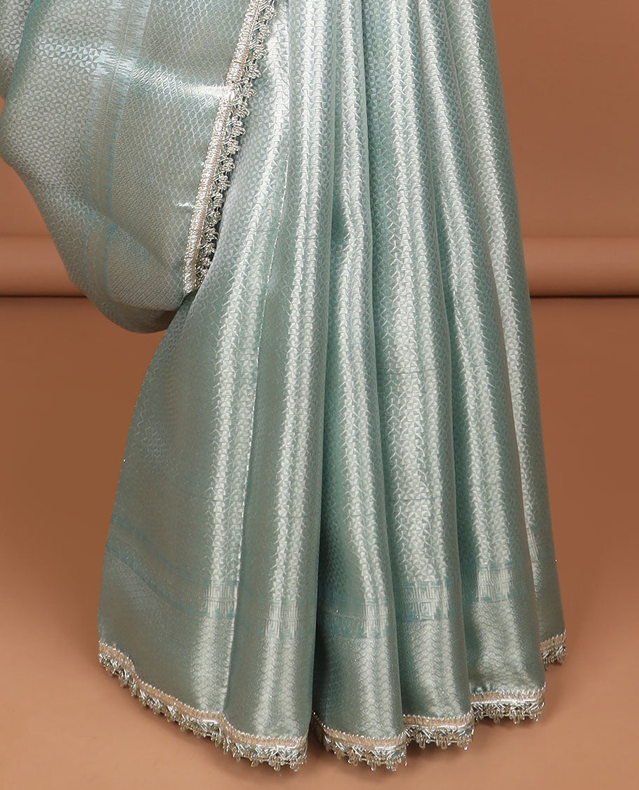 Light blue jacquard tissue saree with self zari design border & intricate zari design pallu