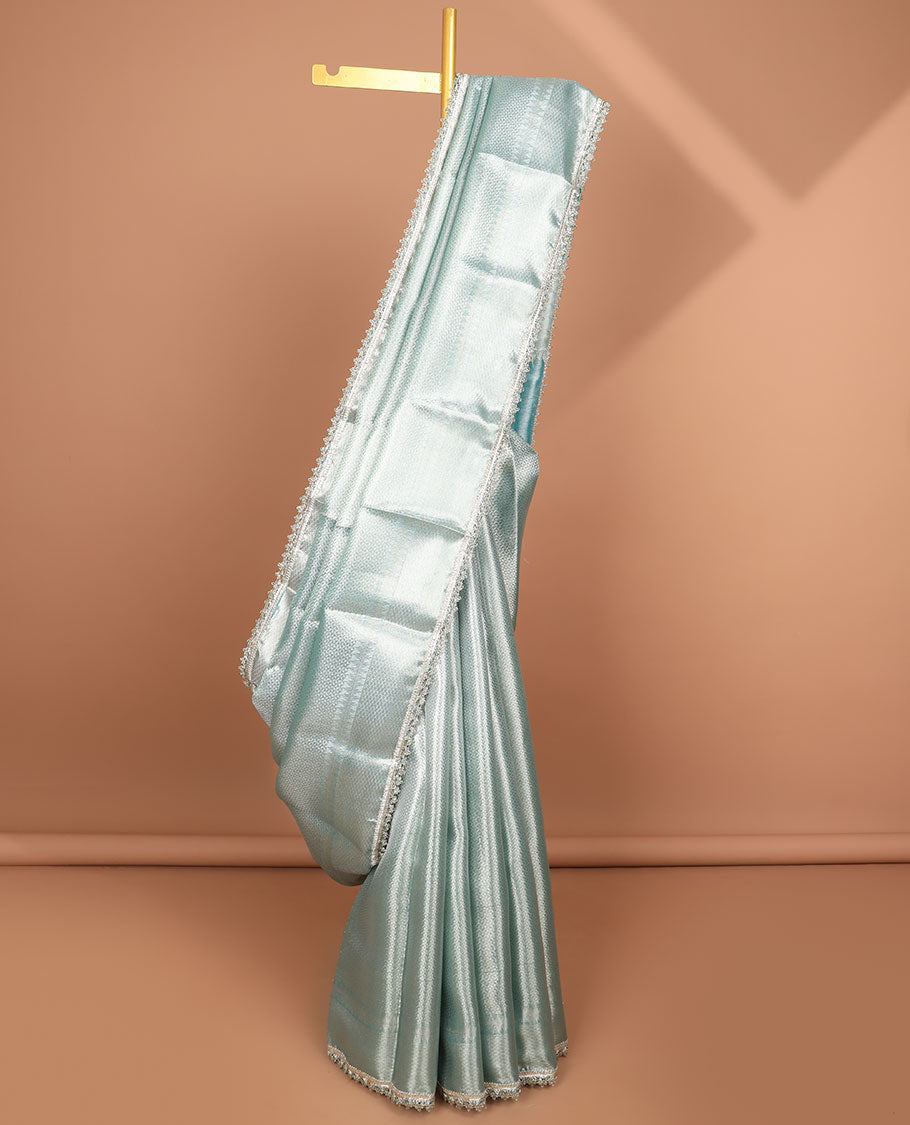Light blue jacquard tissue saree with self zari design border & intricate zari design pallu