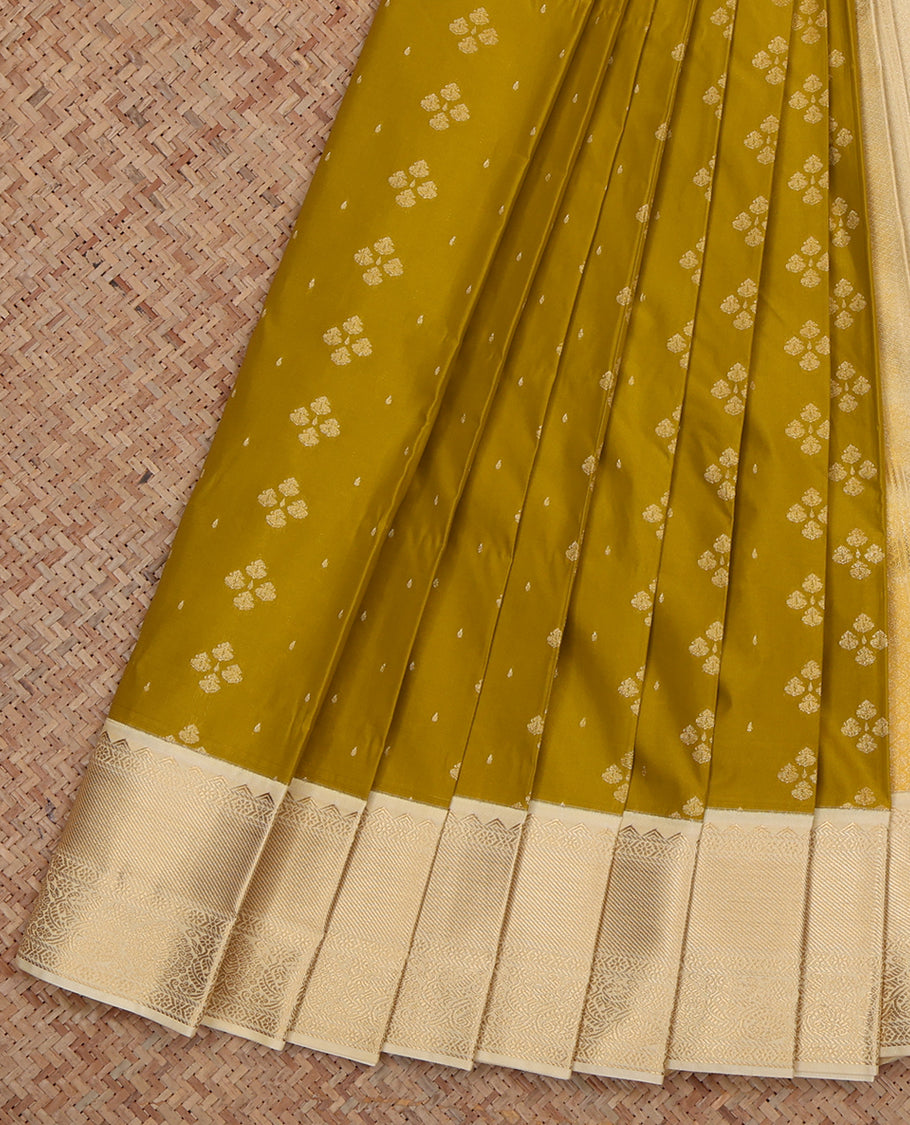 Green Budget Silk Saree, Styled with Zari Buttas , Complemented by a Contrast Traditional Zari Border, Grand Pallu, and Contrast Blouse
