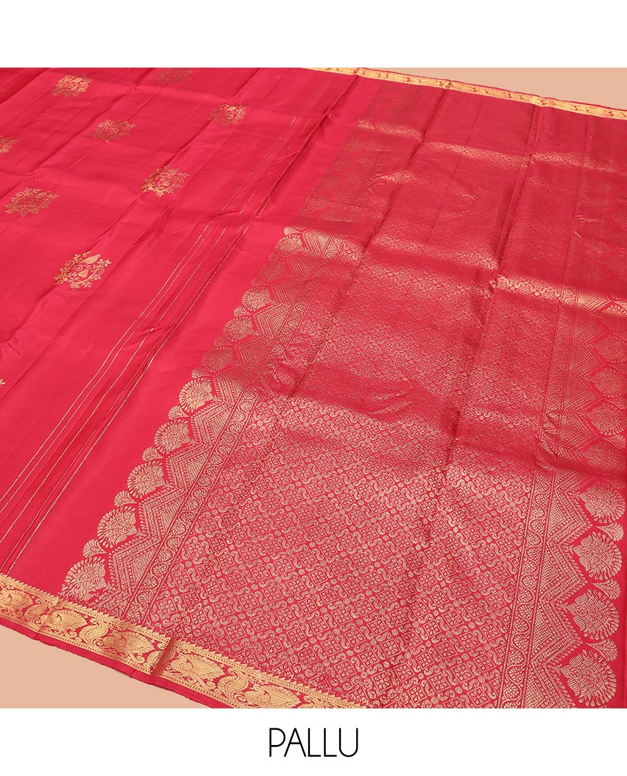 Red Kanchipuram Silk Saree Accentuated with Zari Buttas, Highlighted with Zari Border of Ara Bogudi, Muthu, and Mayil Designs, Grandly Woven Pallu of Jaal Designs, and Paired with a Matching Blouse