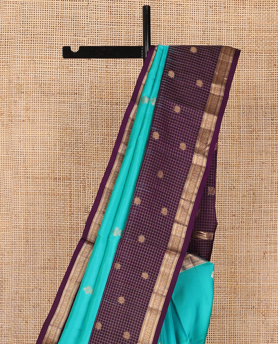 Blue zari buttas soft silk saree, contrast border of thilakam,jada nagam,mayil kann, zari checked & mayil designs & geometric patterned pallu