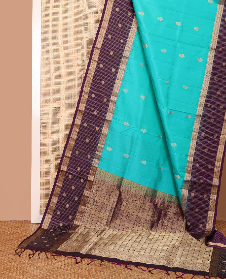 Blue zari buttas soft silk saree, contrast border of thilakam,jada nagam,mayil kann, zari checked & mayil designs & geometric patterned pallu