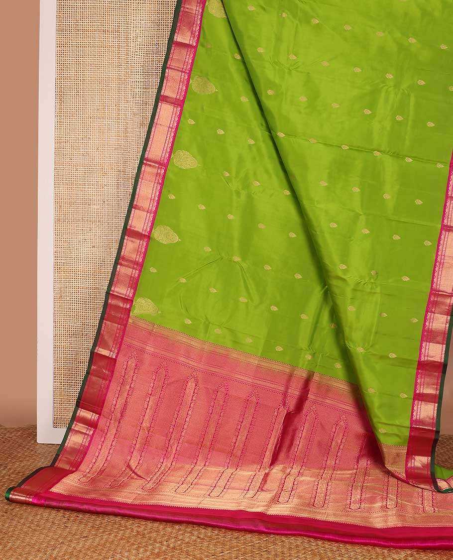 Parrot green zari buttas silk saree, contrast border of rekku, Muthu, poun, and mayil kann, and pallu of mayil kann and manga designs