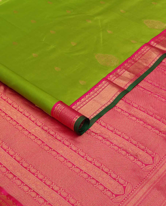Parrot green zari buttas silk saree, contrast border of rekku, Muthu, poun, and mayil kann, and pallu of mayil kann and manga designs