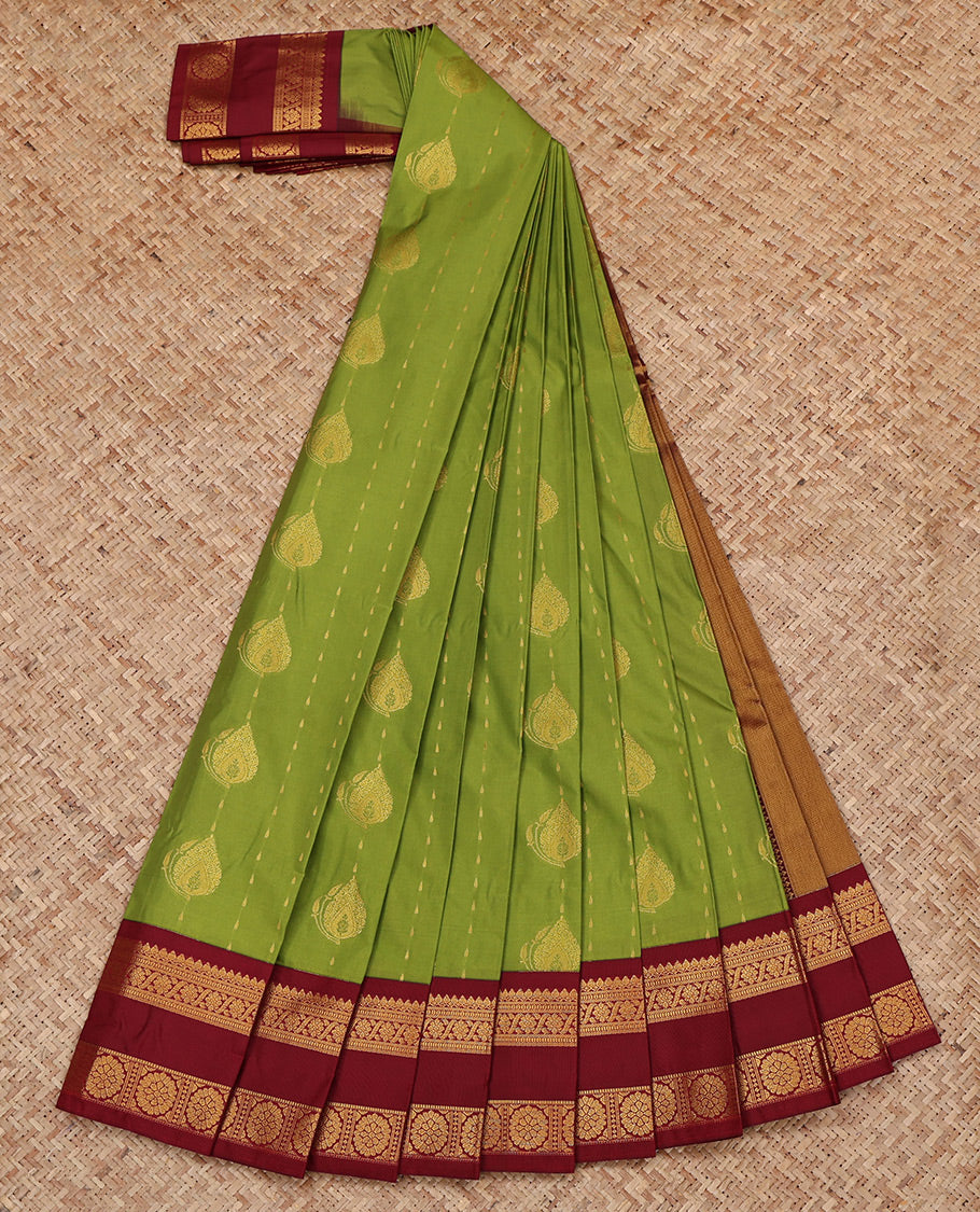 Green Budget Silk Saree, Showcasing Zari Buttas All Over Its Body, Complemented by a Contrast Traditional Zari Design Rettai Pettu Border, Grand Pallu, and Paired with a Contrast Blouse