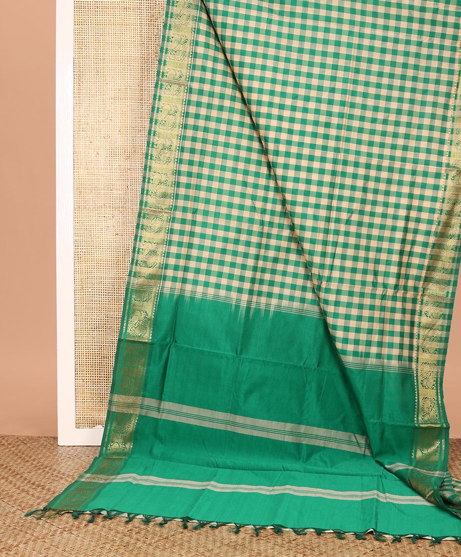 Green Checked Poly Cotton Saree, Highlighted by a Traditional Zari Design Border, Striped Pallu, and Paired with a Matching Blouse