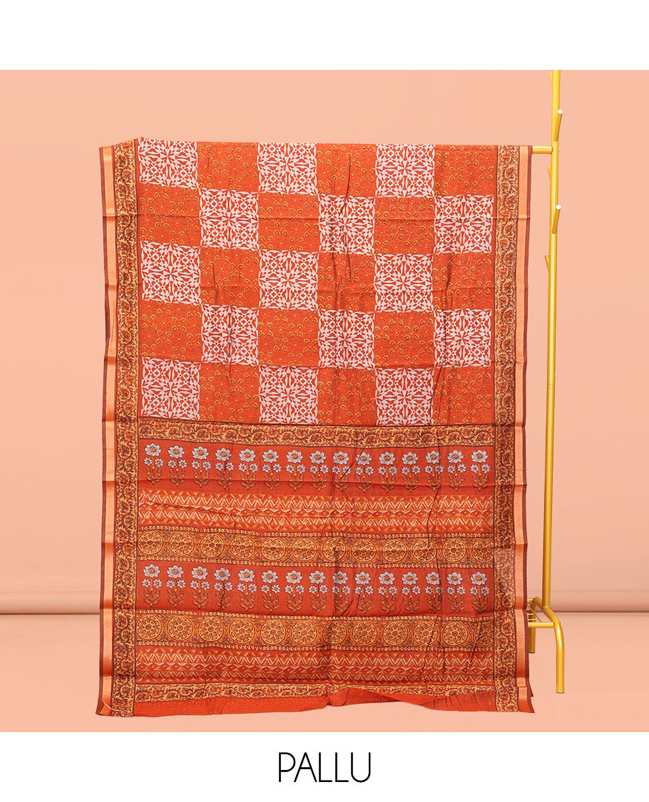 Orange Kanchi Cotton Saree, Adorned with Geometric Patterns Printed All Over Its Body, a Subtle Border, Pallu of Floral and Chakra Print, and Paired with a Matching Blouse