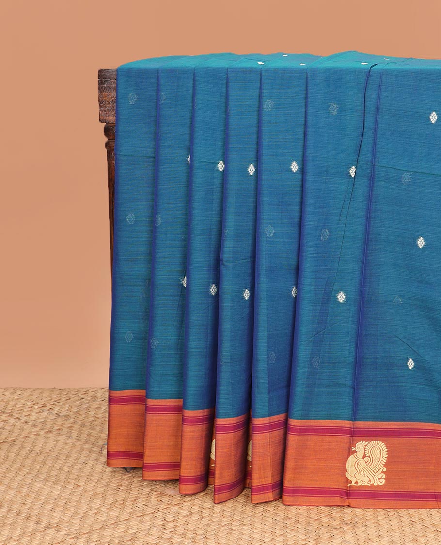 Blue thread buttas Narayanapet cotton saree, contrast peacock motifs border, and pallu of stripes