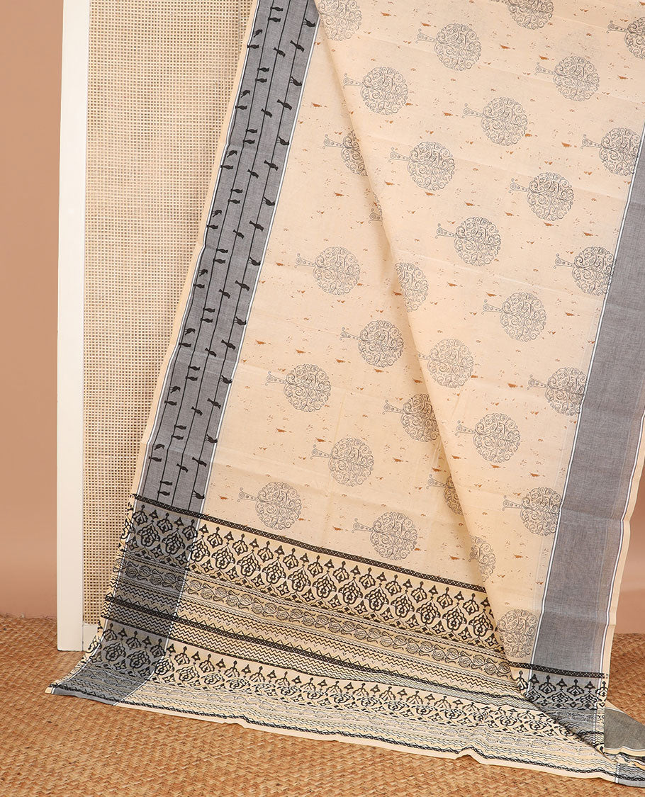 Light sandal floral motifs printed chirala cotton saree, contrast border pictures crow sitting on string design and printed pallu