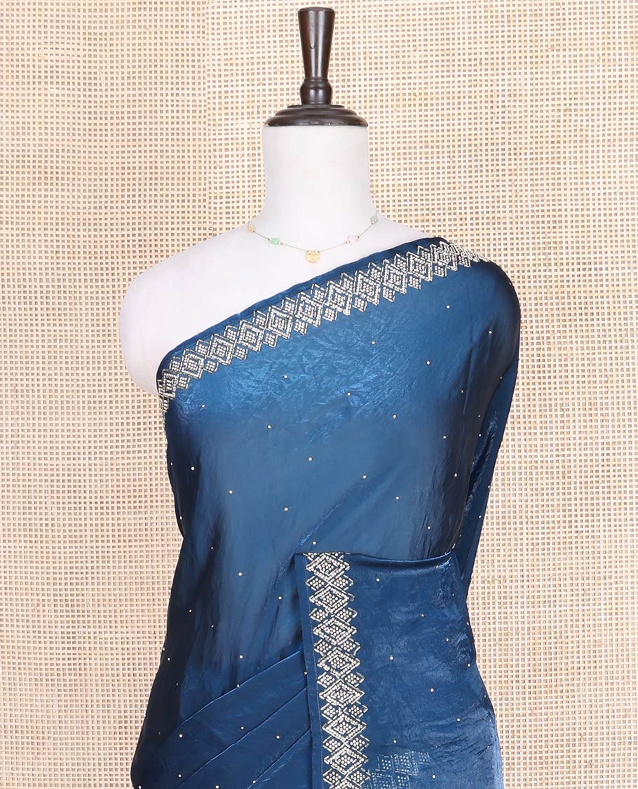 Blue Designer Saree, Accentuated with Stone Struck on Its Body, Highlighted by a Stone Embroidered Border, Self-Pallu, and Paired with a Matching Blouse