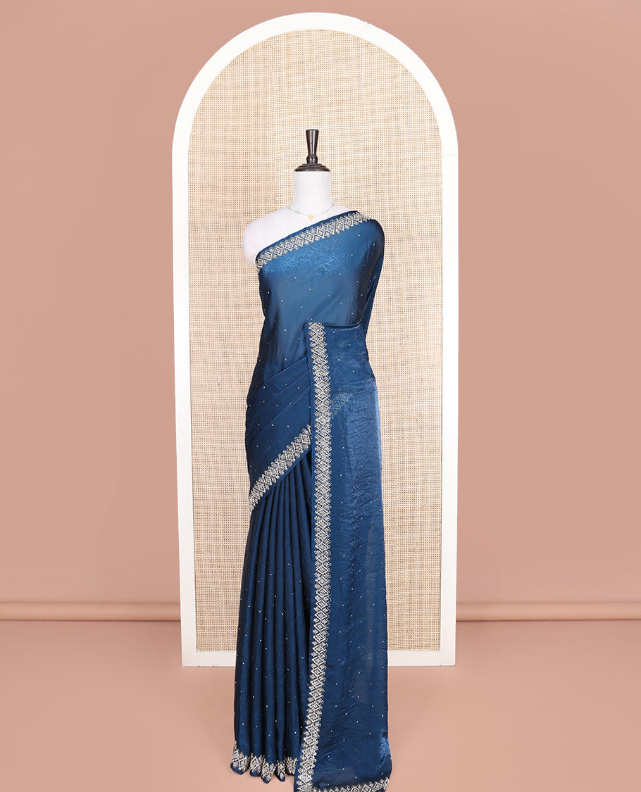 Blue Designer Saree, Accentuated with Stone Struck on Its Body, Highlighted by a Stone Embroidered Border, Self-Pallu, and Paired with a Matching Blouse