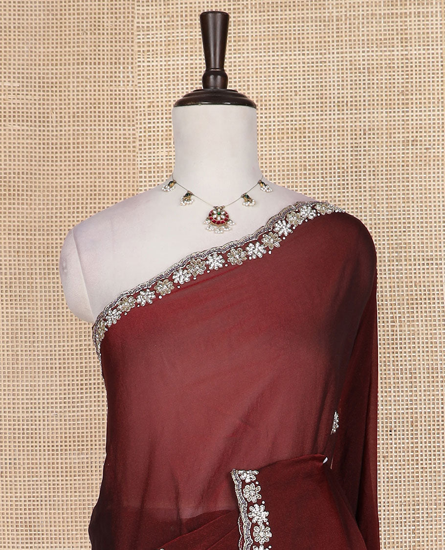 Maroon flower motifs embroidered designer saree, floral embroidered scallop border