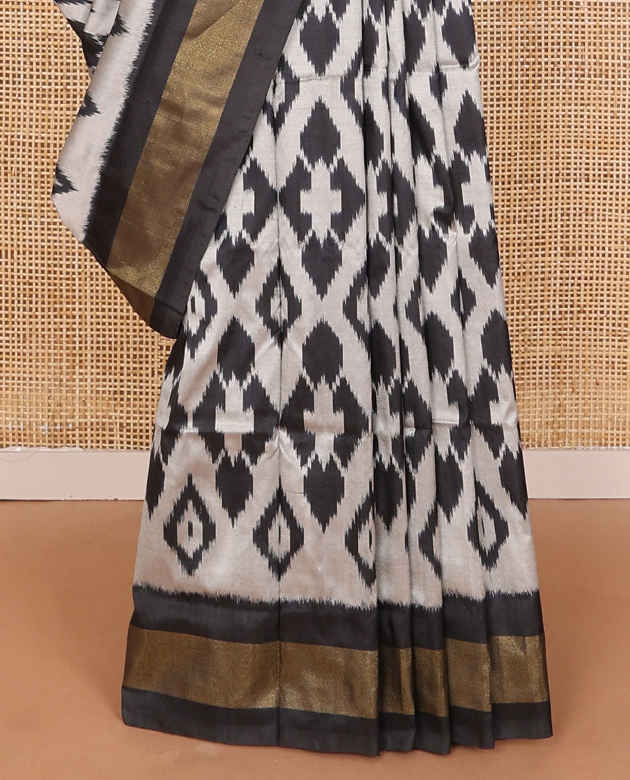 Black & grey ikkat saree with ikkat-style design weave, plain border & pallu of ikkat jaal design