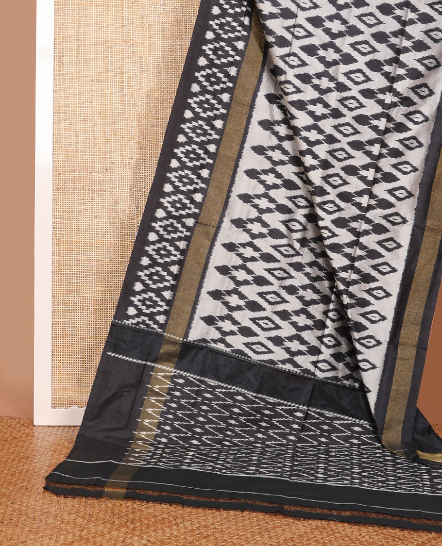 Black & grey ikkat saree with ikkat-style design weave, plain border & pallu of ikkat jaal design