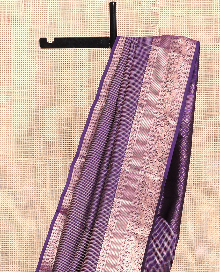 Violet Kanchipuram Silk Saree, Gleamed Up with Micro-Checks, Zari Border of Thilakam Mokku, Chakram, and Kuthirai Designs, Pallu of Jaal Design, and Matching Blouse