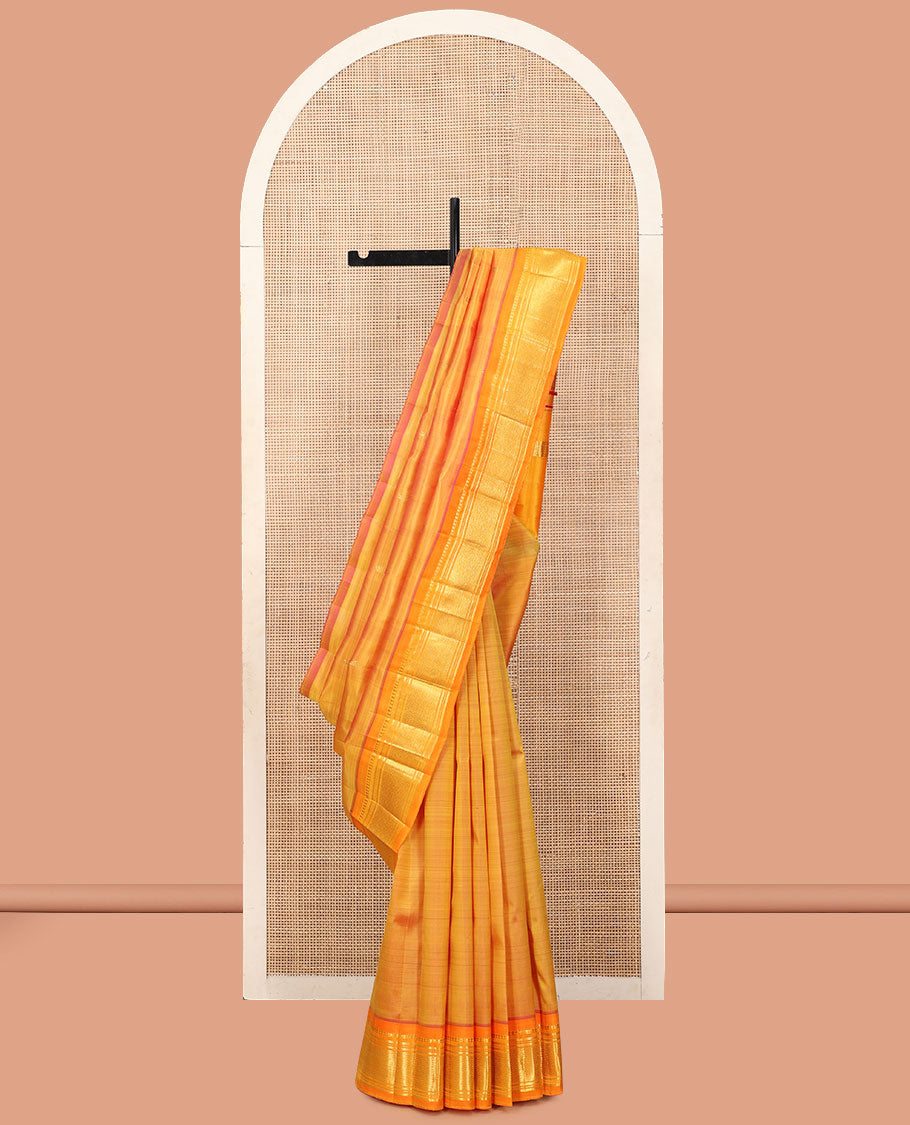 Orange Kanchipuram Silk Saree, Woven with Zari Buttas, a Contrast One-Sided Border of Panner Sombu, Banaras, Muthu, and Jaal Designs, a Zari Design Pallu, and No Blouse