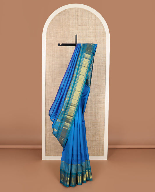 Blue zari buttas Kanchipuram silk saree, contrast border of panner sombu,banaras,muthu & jaal & floral design pallu