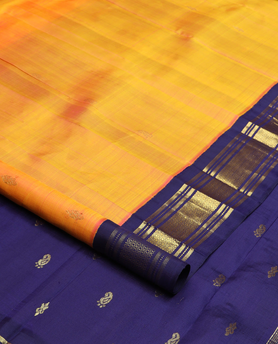 Yellow zari buttas Kanchipuram silk saree, contrast korvai border of banaras, muthu, and jaal design, and zari design pallu