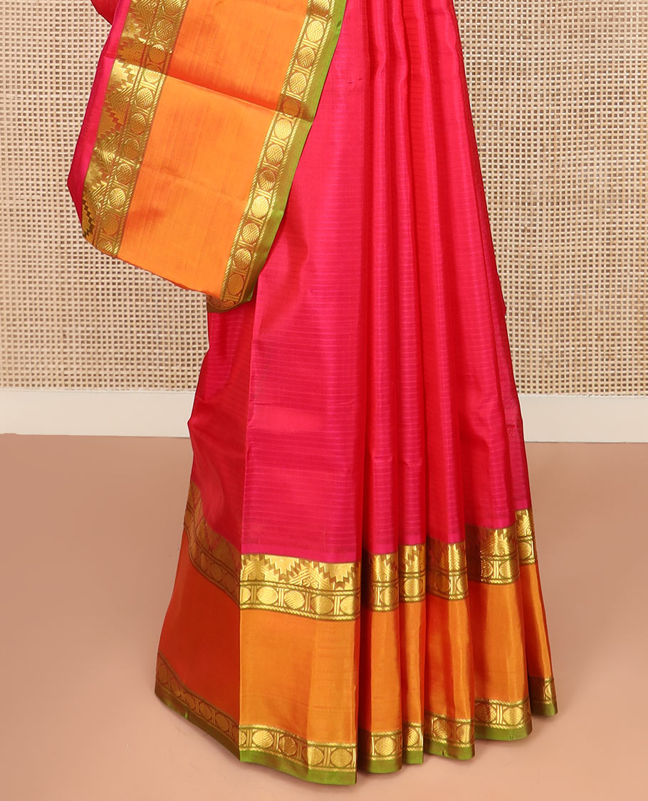 Red Striped Kanchipuram Silk Saree Spotlighted with Contrast Rettai Pettu Border Featuring Thazampoo Rekku, Manga, Banaras, and Rudraksham Designs, a Subtle Striped Pallu, and a Contrast Blouse