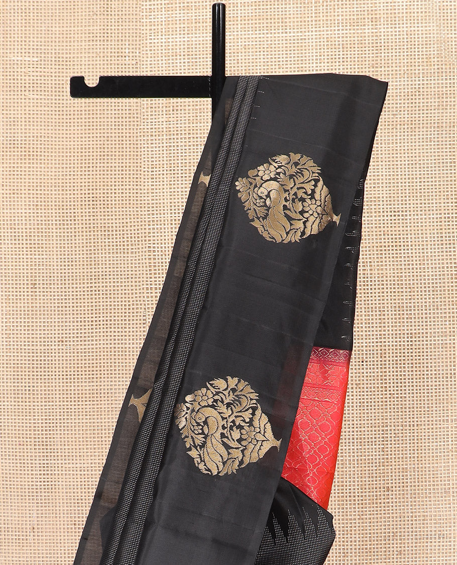 Black Kanchipuram Silk Saree Delicately Woven with Muthu Designs on Its Body, Subtly Sparkled Border of Bird and Floral Designs, Captivating Contrast Pallu of Jaal Designs, and Paired with a Contrast Blouse