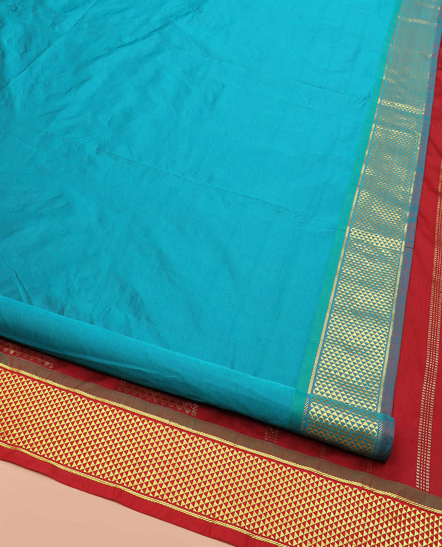 Blue Plain Ten-Yard Art Silk Saree, Complemented by a Contrast Traditional Ara Maadam Border, and Pallu Steeped with Zari Designs,