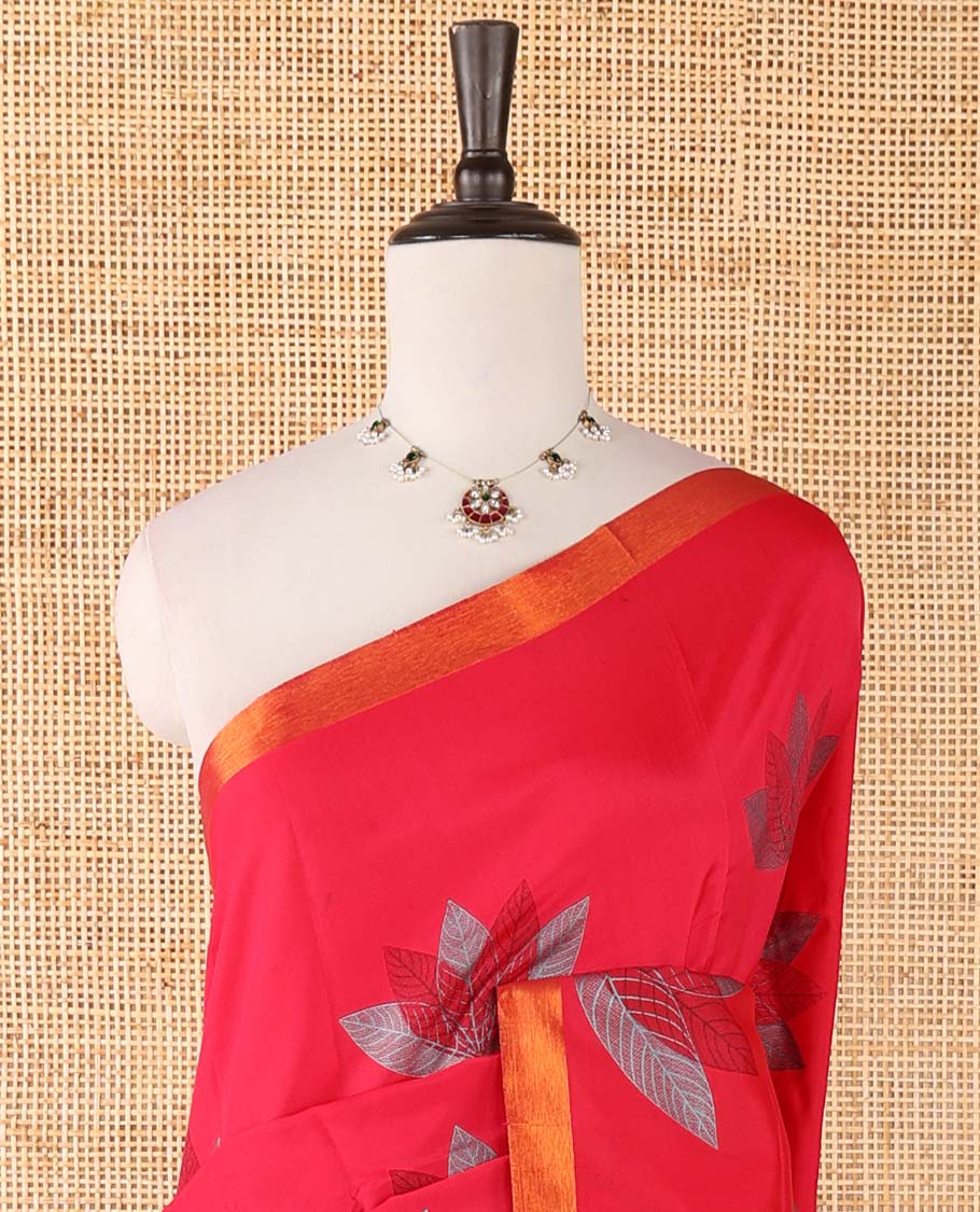 Pink leaf motifs printed micro-silk saree, zari border, contrast eight-petal-like leaf printed pallu & plain green blouse