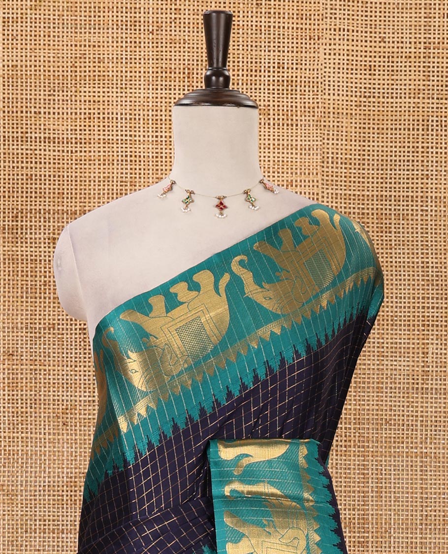 Navy blue checked semi-tafeta saree, contrast temple zari elephant motifs border, striped pallu & matching checked zari border blouse