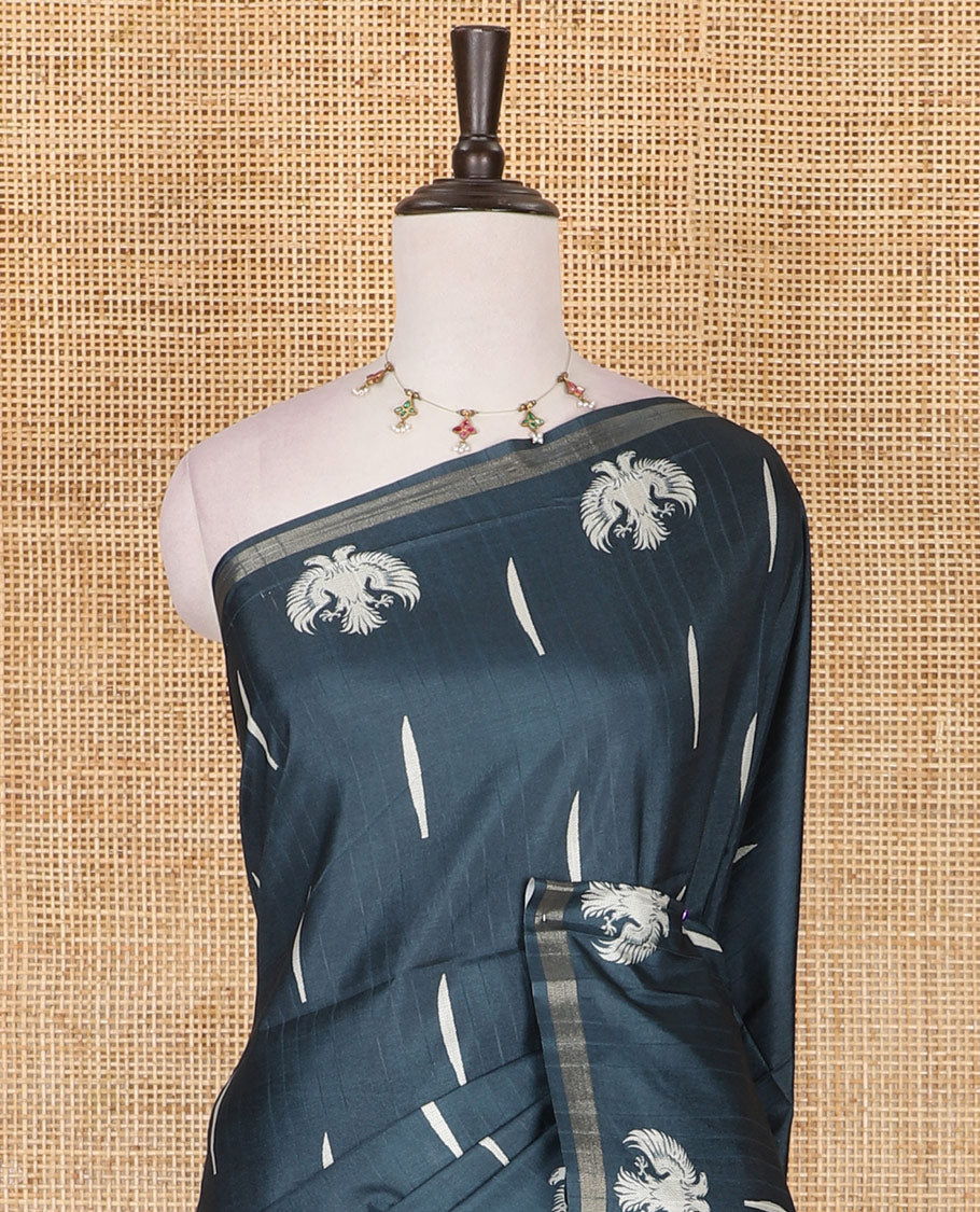 Green jasmine bud motifs printed kathan silk saree, double-headed eagle motif zari piping border, pichwai cow printed pallu, and floral printed blouse