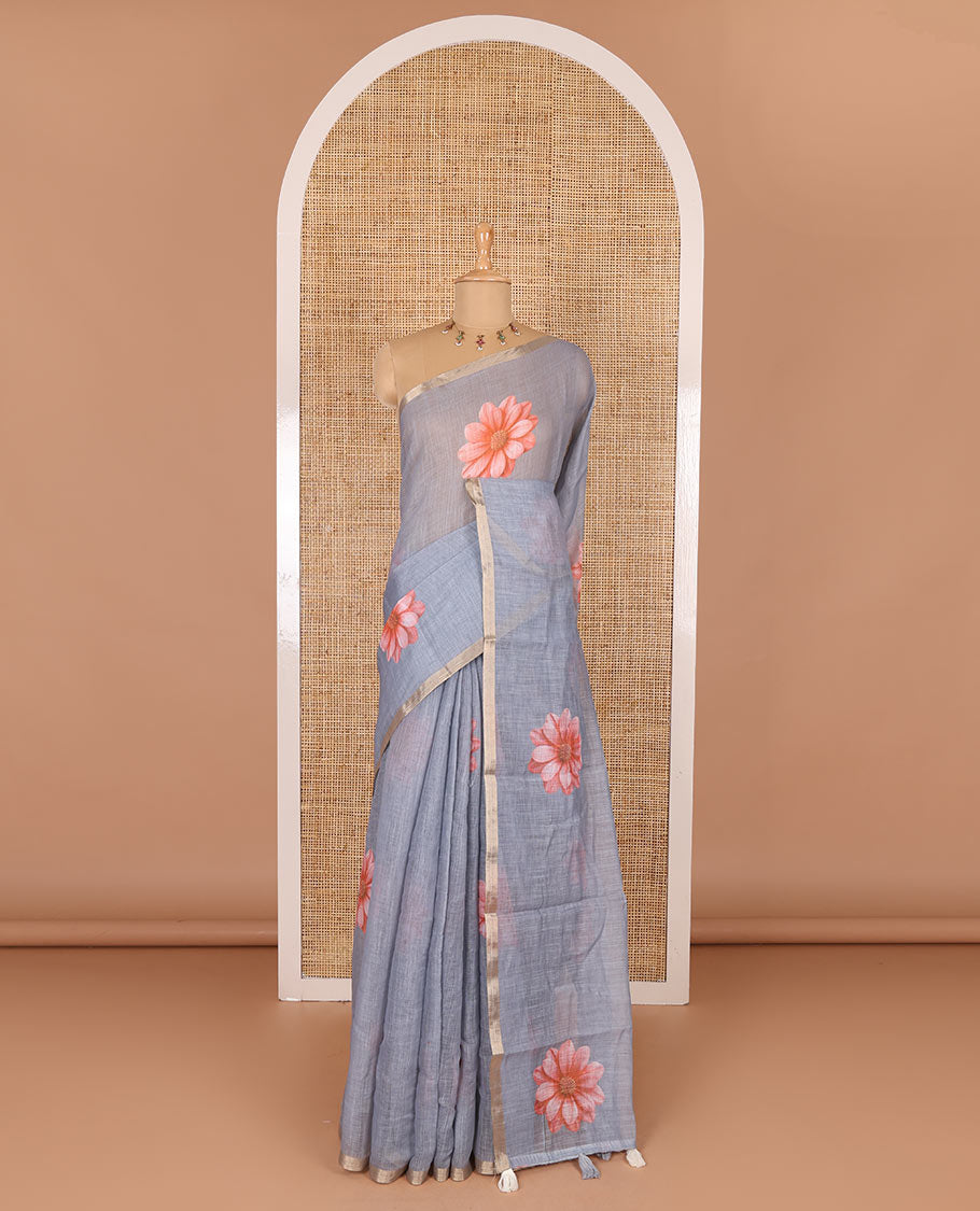 Grey daisy floral printed linen cotton saree, gold zari piping border, daisy floral printed pallu, and matching floral printed blouse