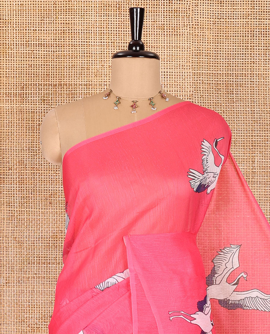 Borderless pink crane motifs printed linen cotton saree, crane motifs printed pallu, and a contrast crane printed blouse