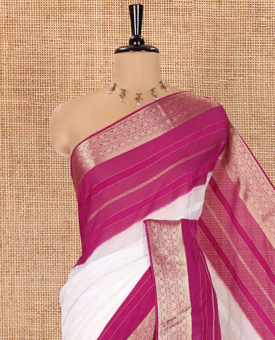 White and Purple Georgette Saree, Subtly Sparkled with Horizontal Zari Stripes All Over Its Body, Complemented by a Contrast Traditional Zari Design Border, Gleaming Zari Striped Pallu, and Paired with a Contrast Blouse