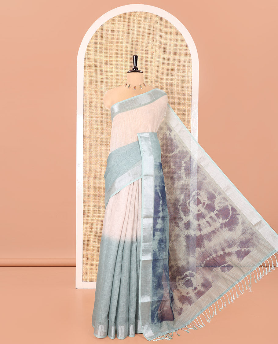 Chikku-Green Linen Cotton Saree, Adorned with Ombre-Style Dye Print, a Subtle Zari Border, Bold Shibori-Printed Pallu, and a Printed Blouse