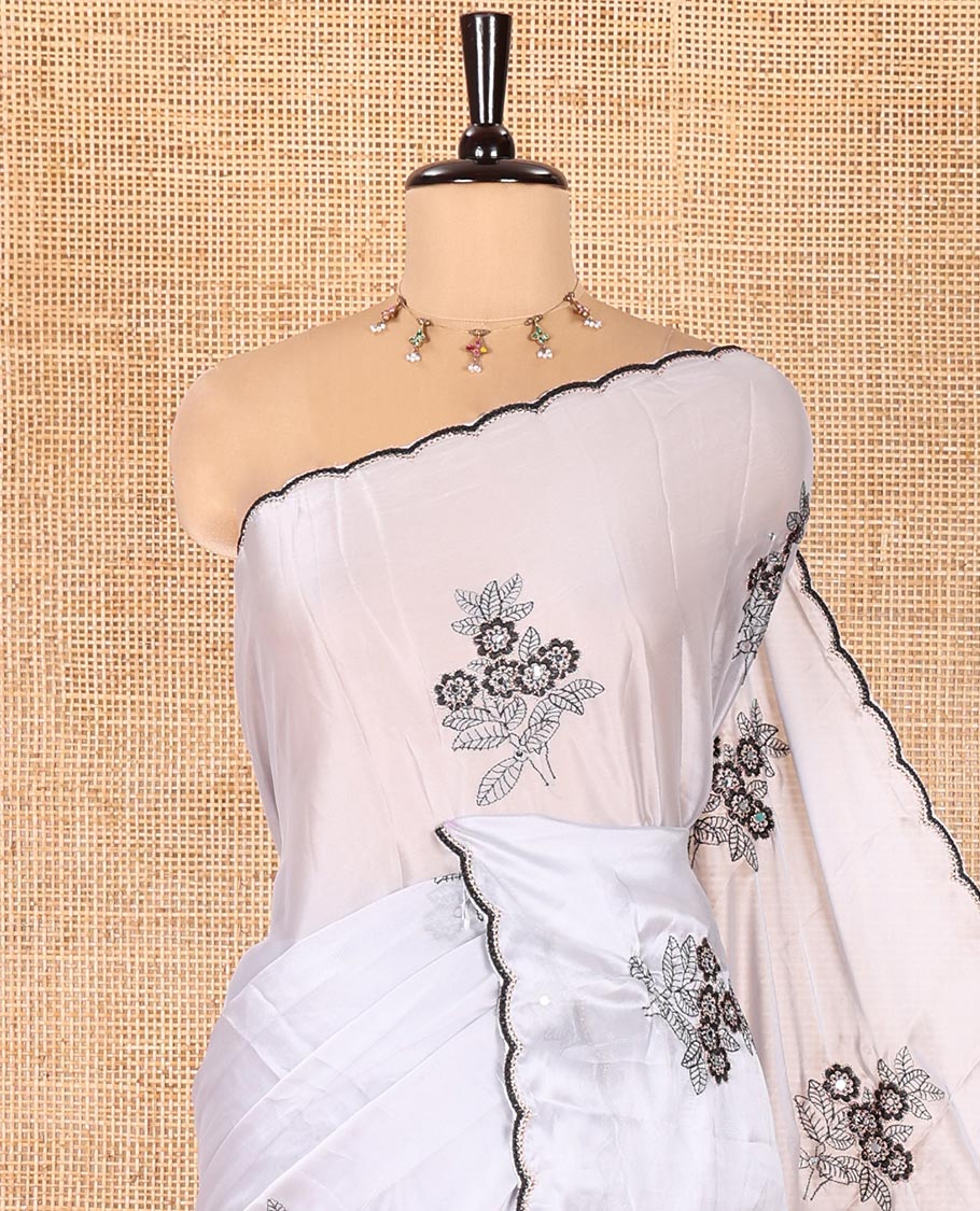 Grey Rangoli Chiffon Saree, Ornamented with Flower-Style Motifs Embroidered on Its Body, a Subtle Scallop Embroidered Border, a Self-Pallu, and Paired with a Contrast Embroidered Blouse