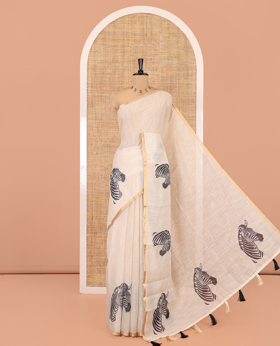 Chikku Linen Cotton Saree, Accentuated with Zebra Motifs Print, A Subtle Piping Border, Zebra Printed Pallu, and Comes with a Contrast Blouse