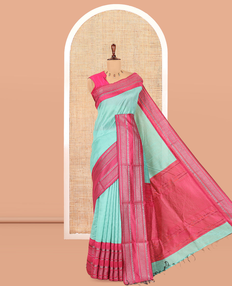 Sea Blue Plain Semi-Raw Silk Saree, a Contrast Silver Zari Border, a Contrast Pallu, and a Contrast Blouse