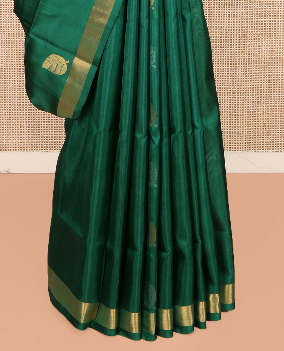 Green Uppada Silk Saree, Subtly Sparkled with Leaf Zari Buttas All Over Its Body, Subtle Bavanji Border, Pallu Steeped with Leaf Buttas, and Paired with a Matching Blouse