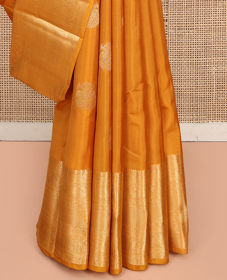 Yellow Vasundhara Lite Silk Mix Saree, Decorated with Zari Buttas, Highlighted by a Zari Border of Thilakam Mokku, Muthu, Kamalam, Mayil, Yaanai, Rettai Neli, and Mayil Kann Designs, Pallu of Mayil Kann Designs, and Paired with a Matching Blouse
