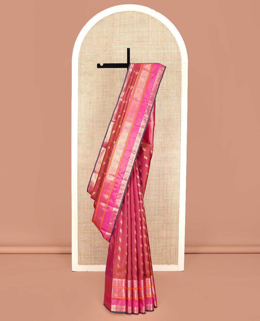 Orange Vasundhara Lite Silk Mix Saree, Graced with Zari Buttas, Complemented by a Contrast Border of Rekku, Rudraksham, Mayil Kann, Kathir, Jada Nagam, and Thilakam Designs, Intricately Designed Pallu, and Paired with a Contrast Blouse