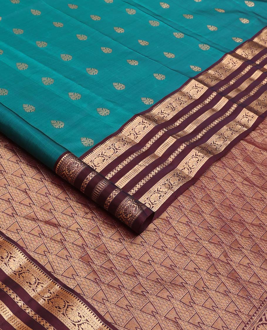 Green zari buttas Vasundhara silk mix saree, contrast border of rekku, neli, vanki, and kodi visiry designs, and temple design pallu