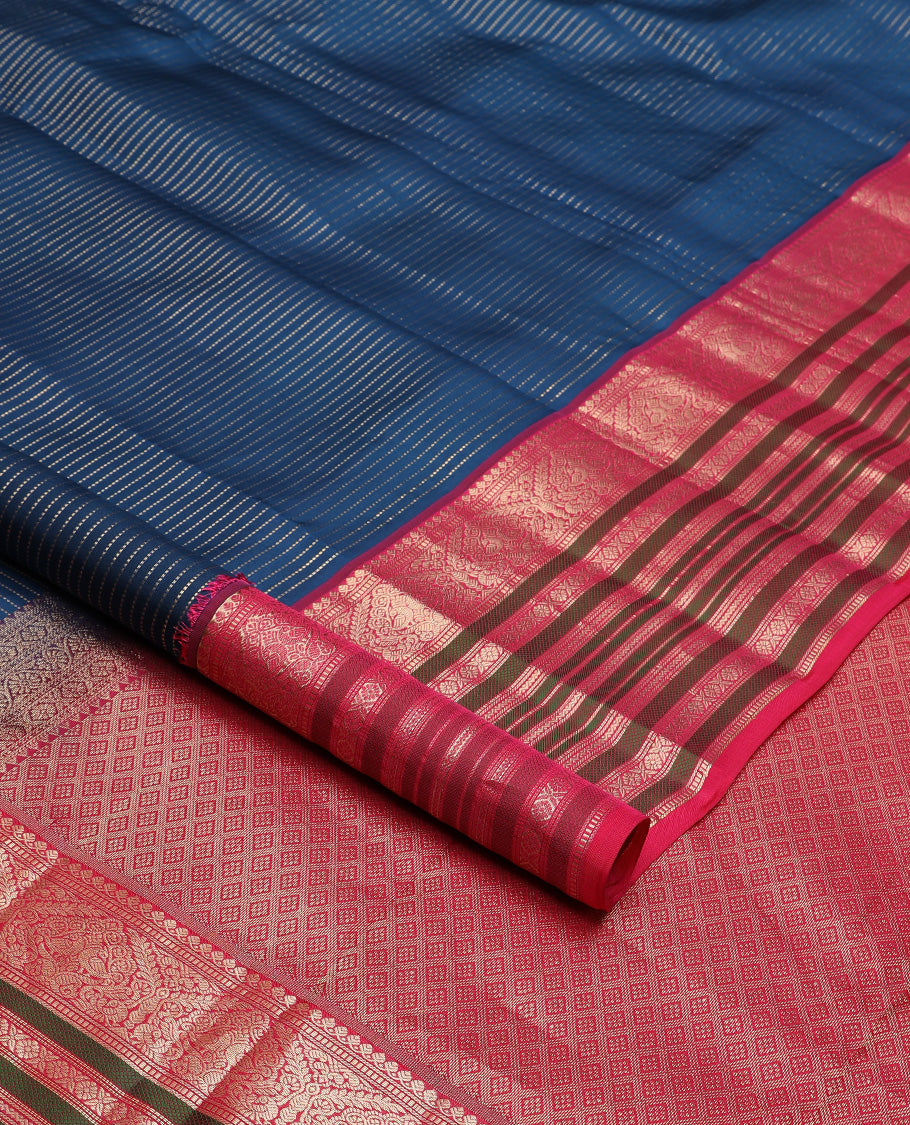 Blue zari buttas silk saree, contrast border steeped with traditional zari designs, and jaal pallu