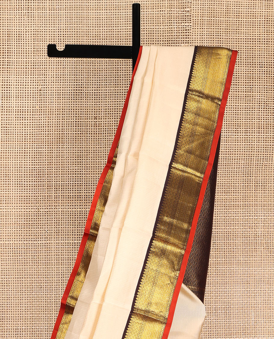 Cream Vasundhara Lite Silk Mix Saree, Sparsely Woven with Stripes on Its Body, Complemented by a Contrast Border of Thilakam, Pai Yaadi, Neli, and Mayil Kann Designs, Intricately Designed Pallu, and Paired with a Contrast Blouse