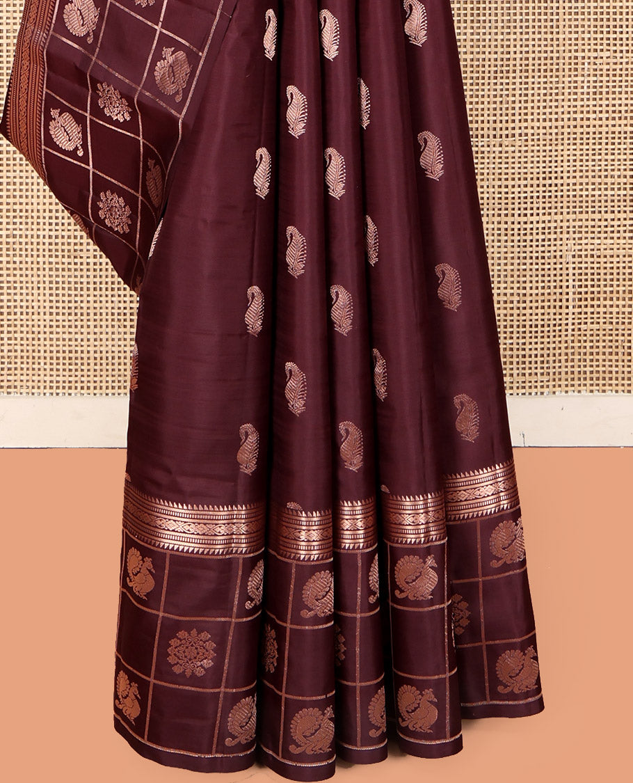 Brown Vasundhara Silk Saree, Artfully Detailed with Zari Buttas, Highlighted by a Zari Border of Rekku, Muthu, Jada Nagam, and Butta Enclosed Checks, Jaal Pallu, and a Matching Blouse