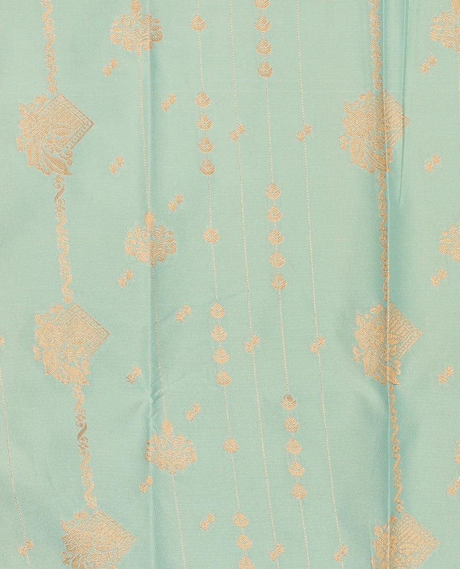 Pista green art silk pavadai set, zari design with contrast traditional zari bordered skirt and a contrast zari design blouse