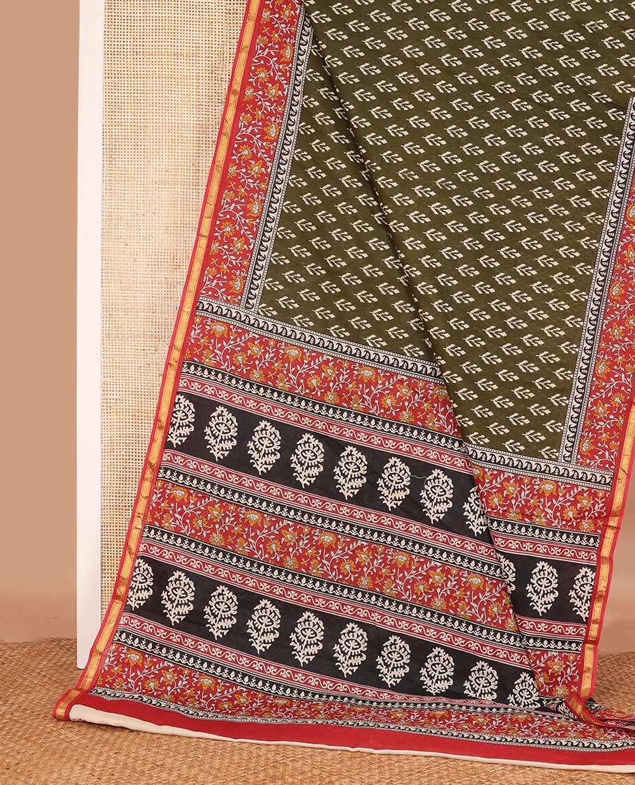 Green unique motifs printed mul mul cotton saree, contrast floral vine printed border, and pallu of floral print