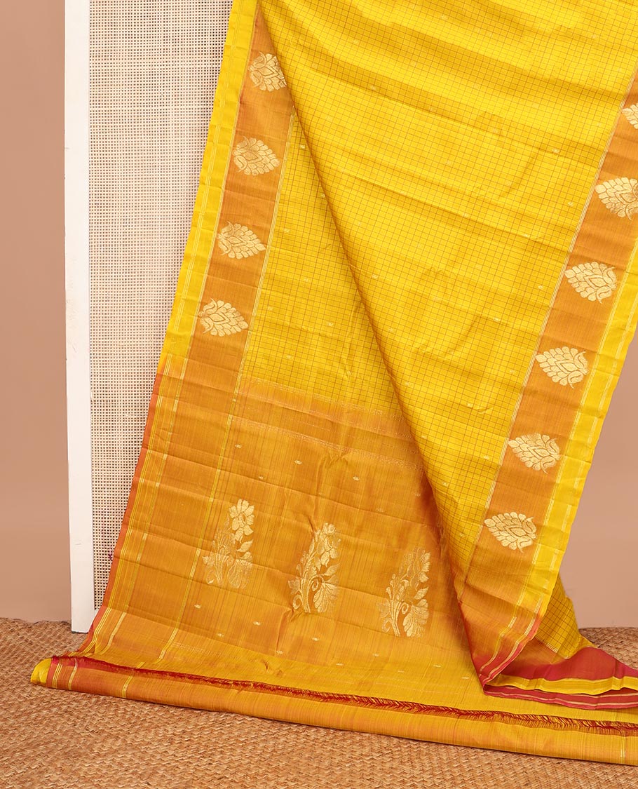 Yellow checked design, and zari buttas Kanchipuram silk saree, contrast zari butta border, and floral dsign pallu