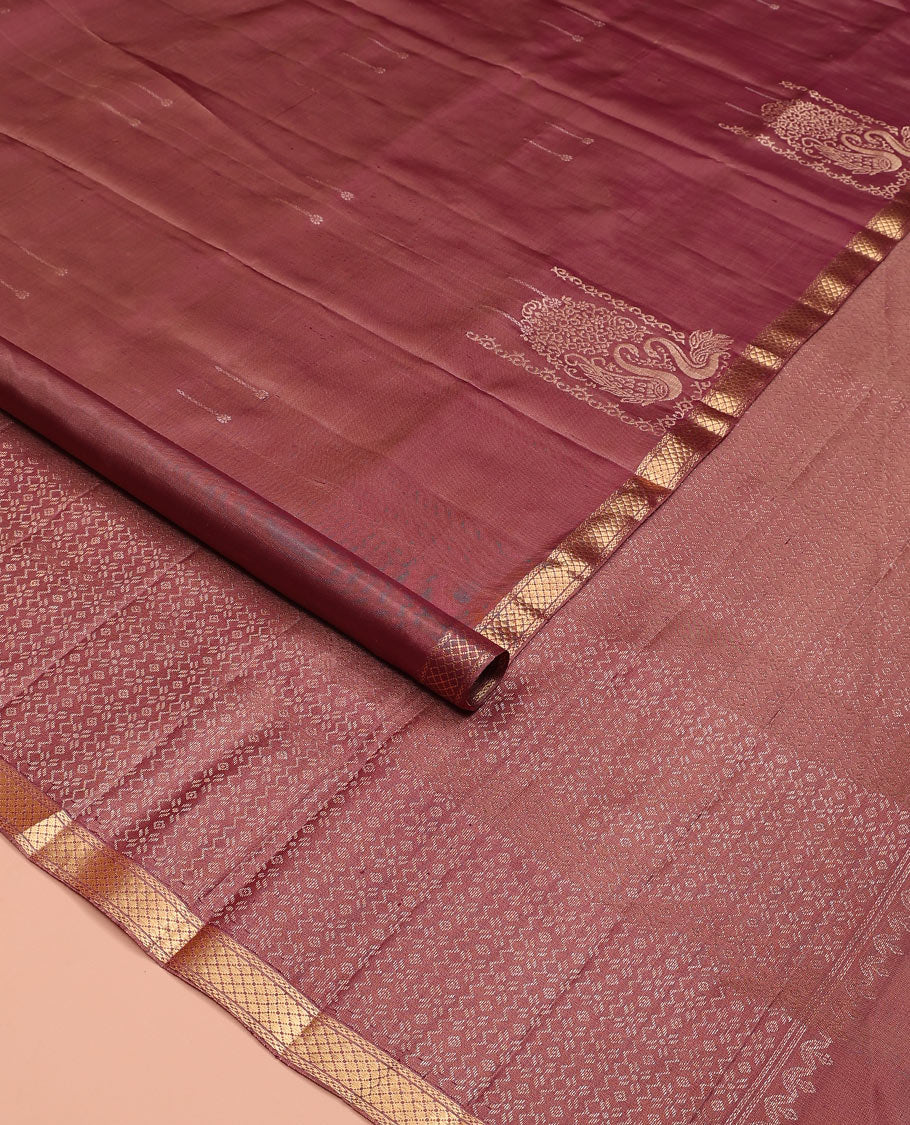 Pink mayil buttas soft silk saree, zari piping border, and pallu of intricate designs